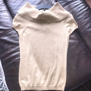 Express Gold short sleeve wide turtleneck shirt.